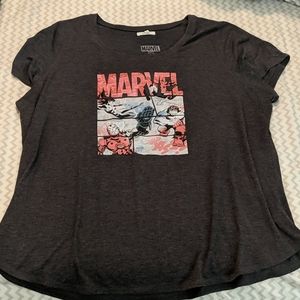 Marvel Maurice's shirt